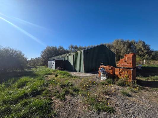 se-vende-casa-de-3d-con-terreno-extenso-y-galpo-6