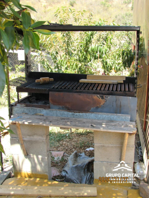 parcela-con-casa,-quincho-y-piscina-4