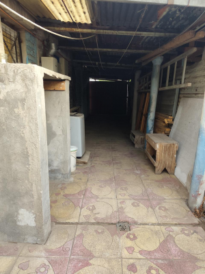 vendo-casa-de-un-piso-en-macul,-con-dos-dormito-7
